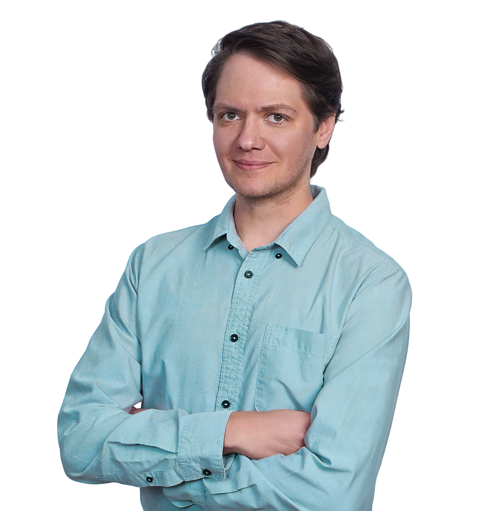 Jared Cochran a man in a teal-colored button down shirt. His arms are folded and he's smiling.